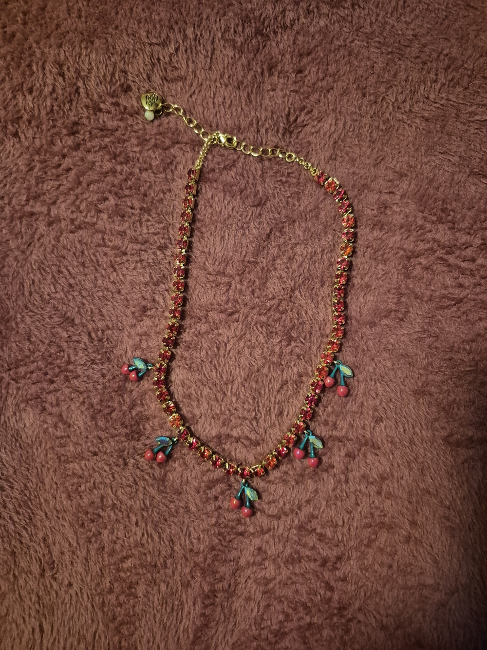 Betsey Johnson Gold-Tone Necklace with Red Crystals and Turquoise Leaves